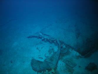 Unidentified steel plate wreckage on seabed
